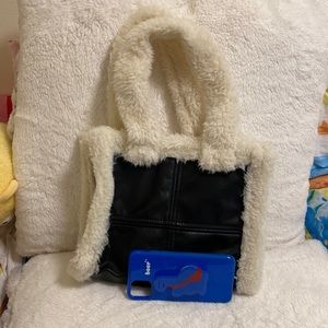 Durable efficient sized fake fur small tote bag.